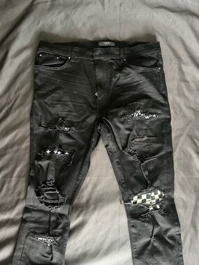 AMIRI Black Distressed Skinny Jeans with Patchwork